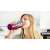 Woman drinking smoothie from Bosch MMB2111M ToGo bottle