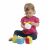 Child playing with Chicco Multi Activity Cubes, early development toy