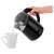 Sencor SWK 1701BK electric kettle pouring hot water into a mug