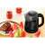 Sencor SWK 1701BK electric kettle on a table with flowers and pastries