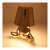 GOLD MAN model 7 gold table lamp, sitting bear design, with shade, turned on