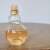 Azzaro Orange Tonic Eau de Toilette, 100 ml, teszter üveg asztalon