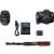 Canon EOS 2000D DSLR camera kit with lens, charger, battery, strap, and accessories