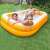 Family enjoying Intex inflatable pool, 229 x 147 x 46 cm, yellow and white