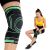 4Fizjo Elastic Knee Stabilizer L - Black and Green, worn by a woman