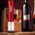Red Electric Wine Opener in Aesthetic Setting with Wine Bottles and Glasses