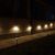 Outdoor LED string lights providing ambient lighting on a patio