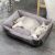 Cat relaxing in a Purlov black and grey pet bed.
