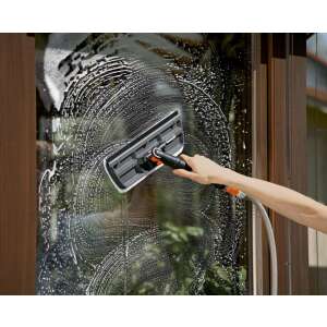 Gardena window cleaning tool in use, cleaning a window - Cleaning