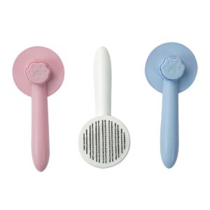 Rosa, weiße und blaue Tierpflegebürsten - Viehzucht