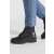 Guess Damen schwarze Lederboots werden mit Blue Jeans getragen, um Stil und Passform zu zeigen