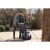 Man using Scheppach Compact 8T log splitter in outdoor setting