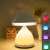 White mushroom shaped LED touch lamp with 7 color changing lights showing different colors