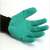 Back of the green gardening gloves with black claws