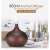 Dark brown wooden aroma diffuser with LED light, 400ml capacity, 10 hours runtime, timer, remote control, in a living room setting