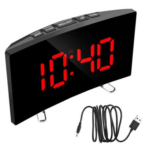 Black digital alarm clock with curved mirror display and red LED, showing the alarm, snooze, light, up, and down buttons, and the USB charging cable