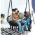 Couple relaxing in a black double hammock swing chair with cushions, Pepita