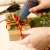 Using a Handy 15W hot glue gun to decorate a gift box