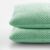 Close-up of Decoking HENRY mint green geometric embossed cushion covers