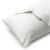 Biała poszewka na poduszkę z etykietą marki RESTILO