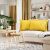 AmeliaHome Ophelia yellow pillow covers on a sofa in a living room setting