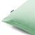 Close-up of DecoKing AMBER mint green cushion cover with Restilo tag