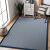 Hakano Wink Lines blue striped rug in living room setting