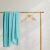 DecoKing HENRY turquoise blanket draped on a rack, home decor