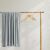 DecoKing MIC grey microfiber blanket hanging on a wooden rack with hangers