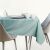 AmeliaHome Empire mint green oval tablecloth on a set table.
