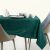 AmeliaHome Gaia glass green embossed tablecloth on table setting