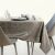 AmeliaHome Gaia cappuccino embossed tablecloth on dining table.