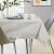 AmeliaHome Gaia cream embossed tablecloth in a modern dining room
