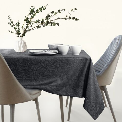 AmeliaHome Gaia graphite gray embossed table runner on dining table.