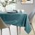 AmeliaHome Gaia teal embossed tablecloth in a modern dining room