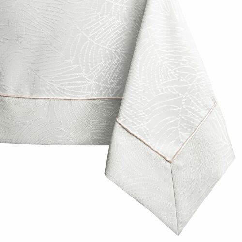 Close-up of AmeliaHome Gaia cream embossed tablecloth corner detail