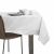 AmeliaHome Gaia white embossed tablecloth on a wooden table