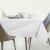 AmeliaHome Gaia white embossed tablecloth on a table setting
