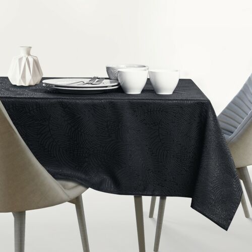 AmeliaHome Gaia black embossed tablecloth on a dining table.