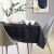 AmeliaHome Gaia black embossed tablecloth in a dining setting