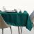 AmeliaHome Gaia glass green embossed tablecloth on dining table setting.