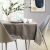 AmeliaHome Gaia cappuccino tablecloth on a dining table in a bright room.
