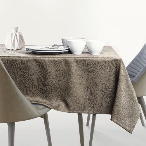 AmeliaHome Gaia cappuccino embossed oval tablecloth on a set table
