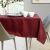 AmeliaHome Gaia Claret embossed tablecloth on a set table.