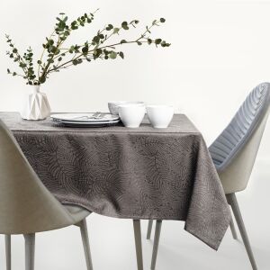 AmeliaHome Gaia brown embossed oval tablecloth on a set table. - Interior design