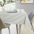 AmeliaHome Gaia cream tablecloth with embossed leaf design on table