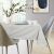 AmeliaHome Gaia cream embossed tablecloth on dining table setting