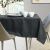 AmeliaHome Gaia graphite gray tablecloth on a dining table.