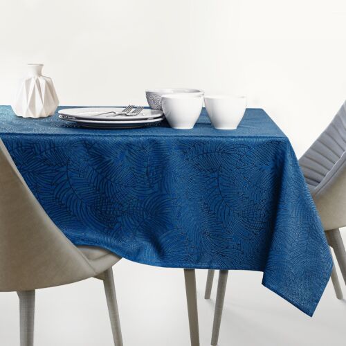 AmeliaHome Gaia indigo blue embossed tablecloth on a set table