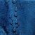 Close-up of waterproof AmeliaHome Gaia indigo blue embossed tablecloth